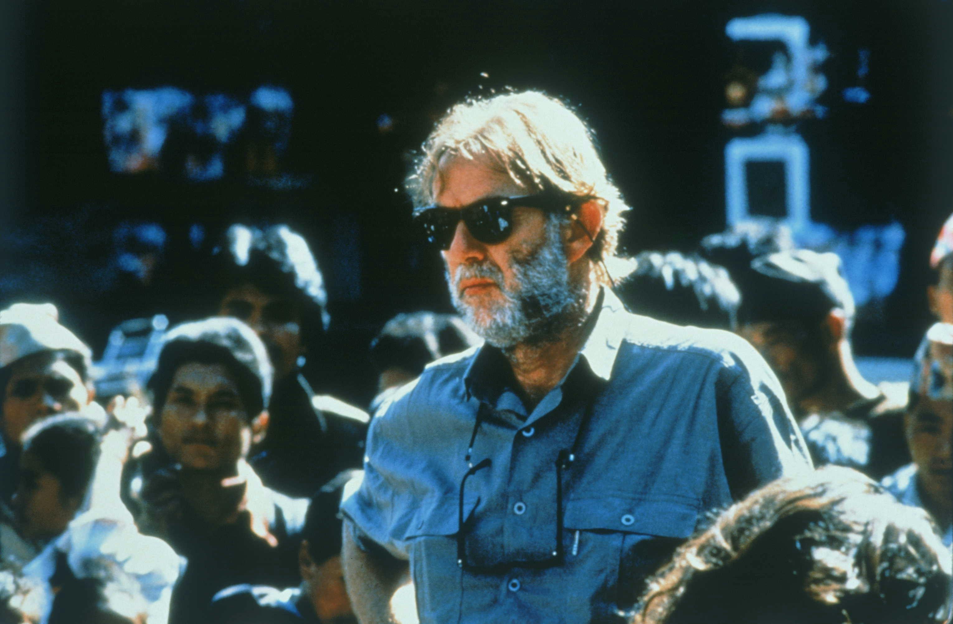 Close-up of a man wearing sunglasses in the crowd