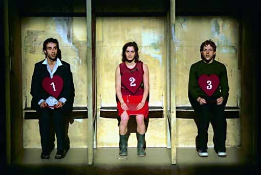 three artists sitting in three different booths with a heart on their chest and numbers above them