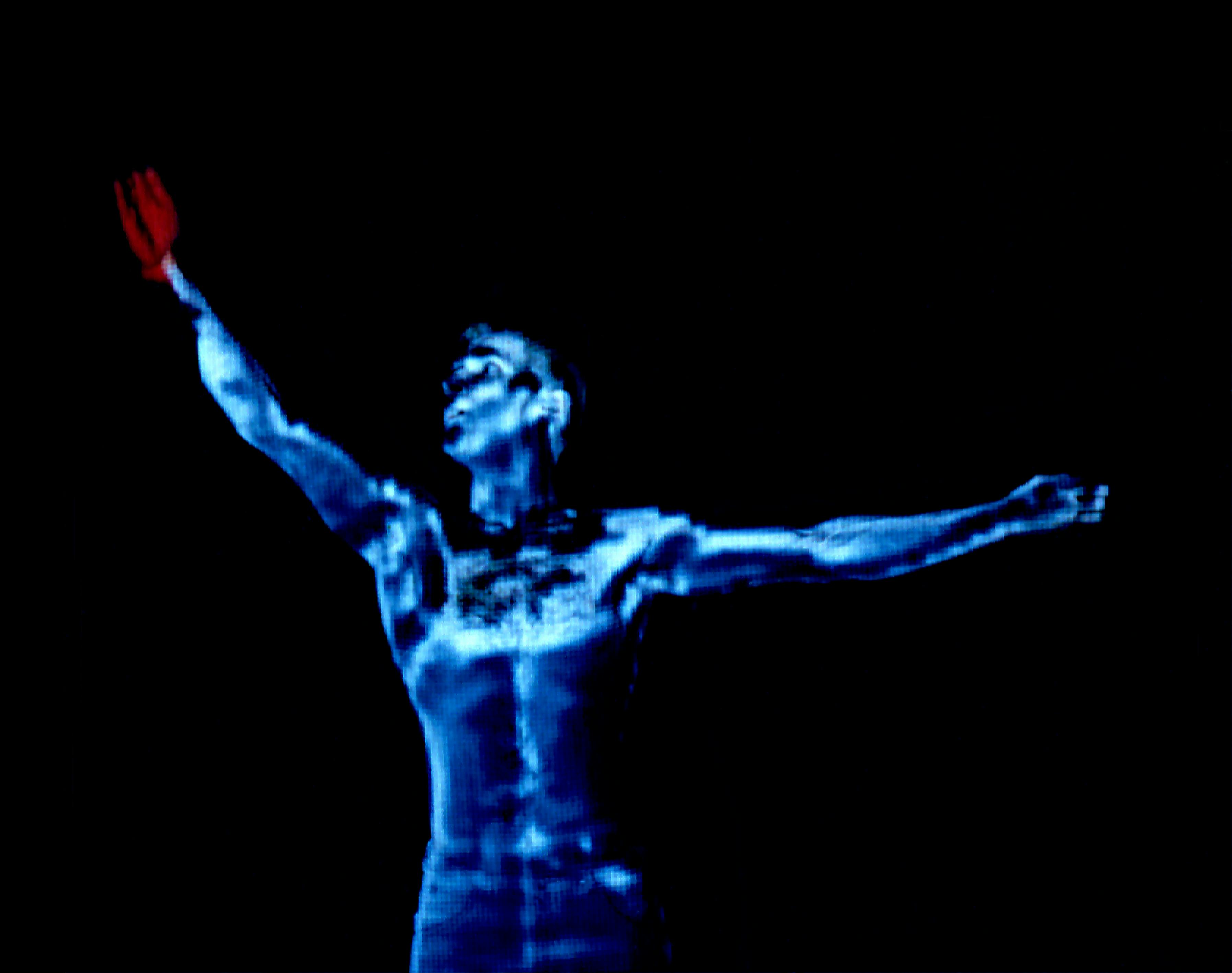 The high-tech image depicts a dancer as a blue figure with a red hand on a black background