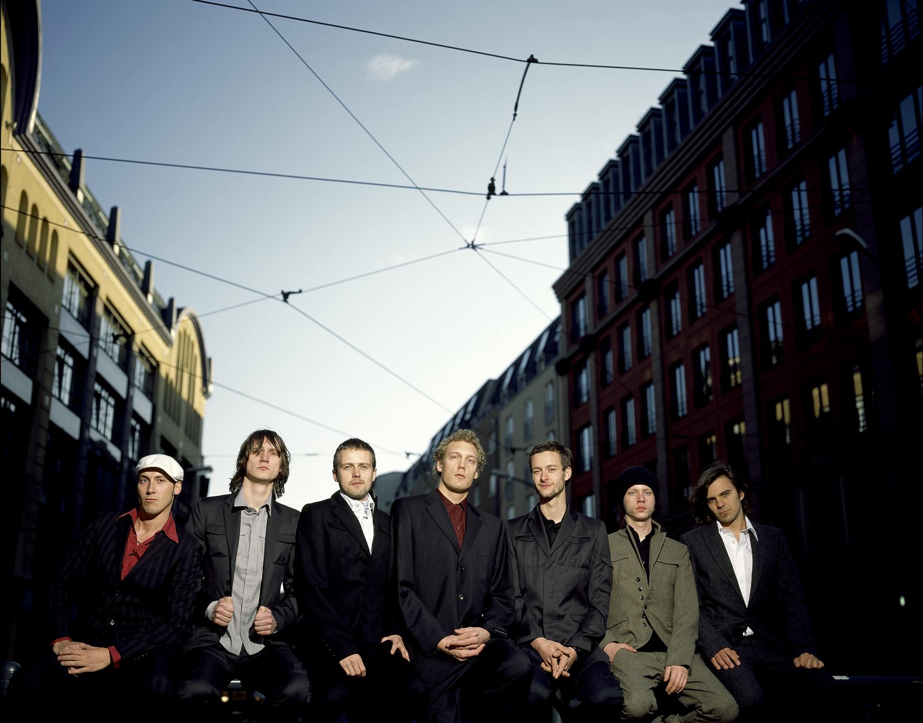 The Pfadfinderei and Modeselektor, seven members posing in the city