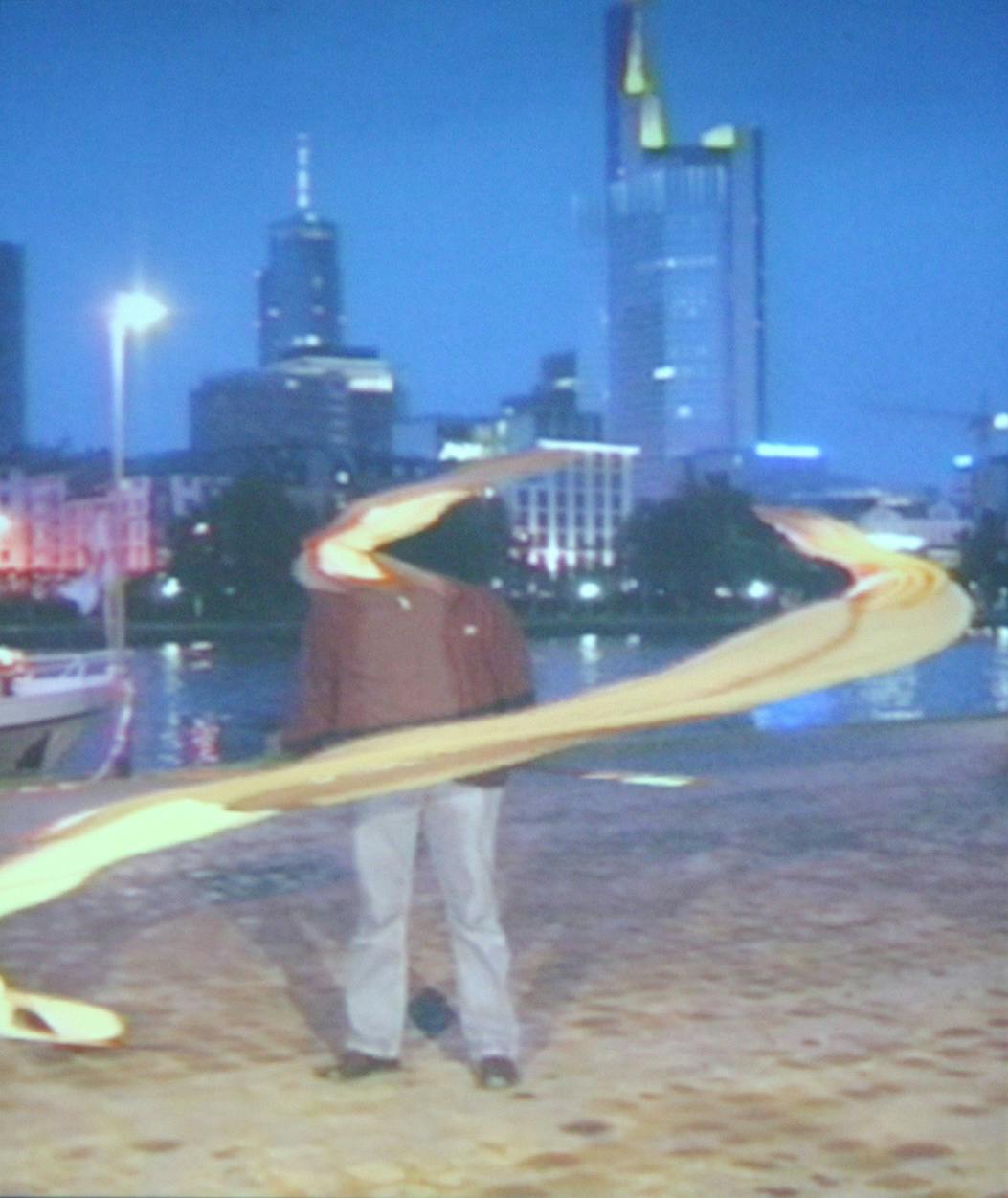 Abstract image of a person in the city with light beams and buildings in the background