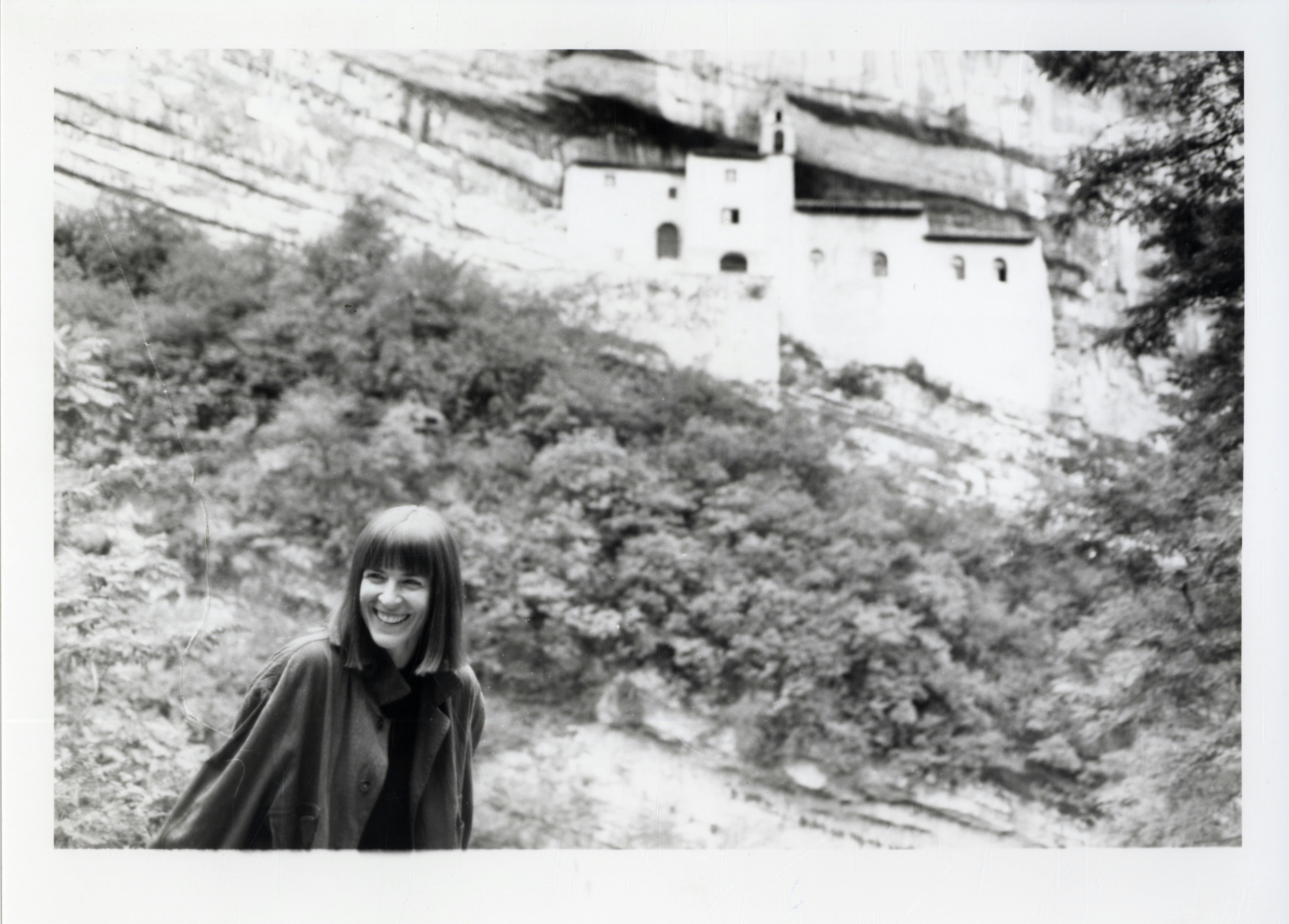 Photograph by Dana Reitz, in the background a tall building and trees