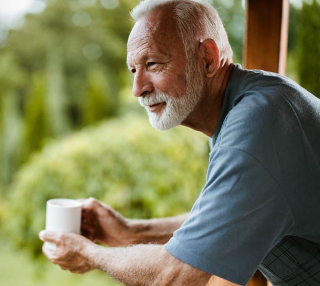 Man holding a coffee cup