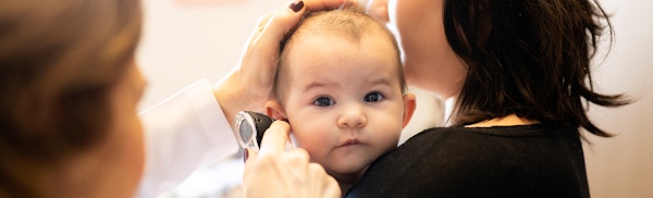 doctor treating baby