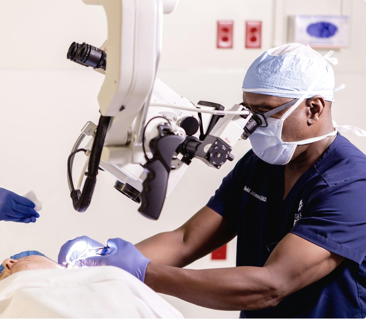 Male physician treating a patient