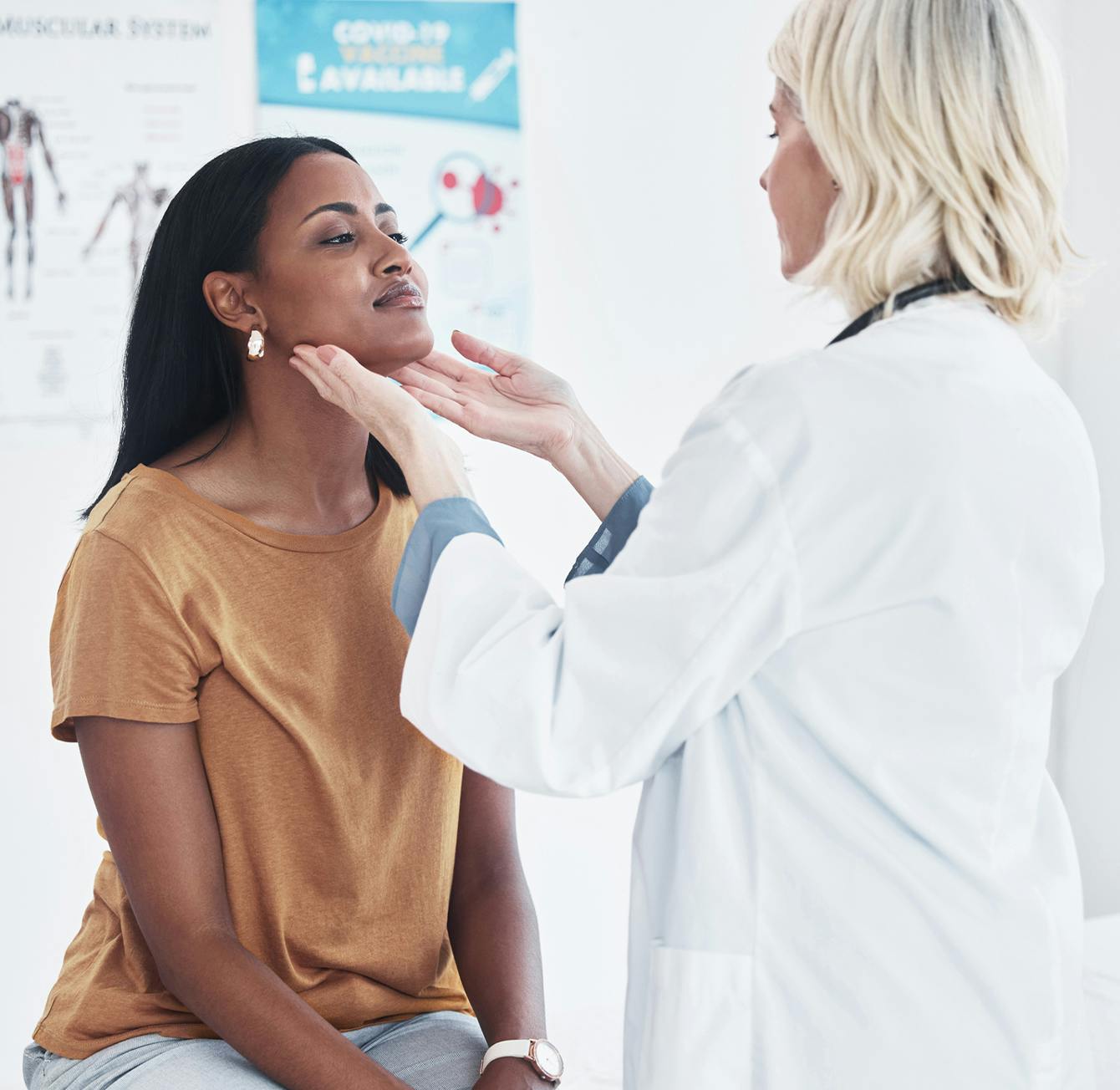 doctor inspecting patient's neck