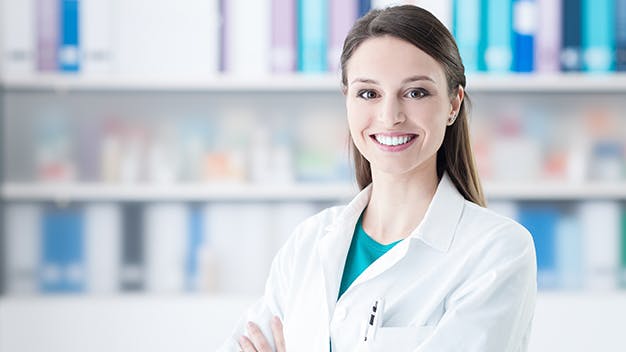 an image of a female doctor in a white coat