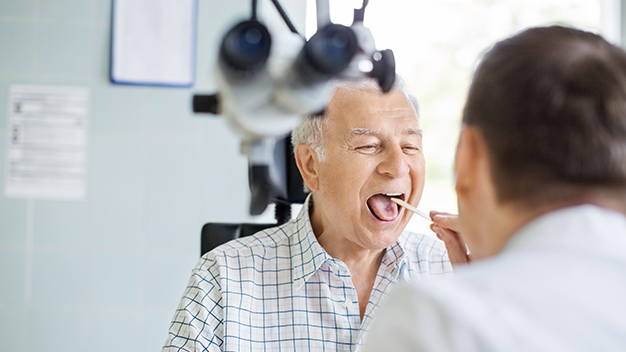 Male physician with male patient