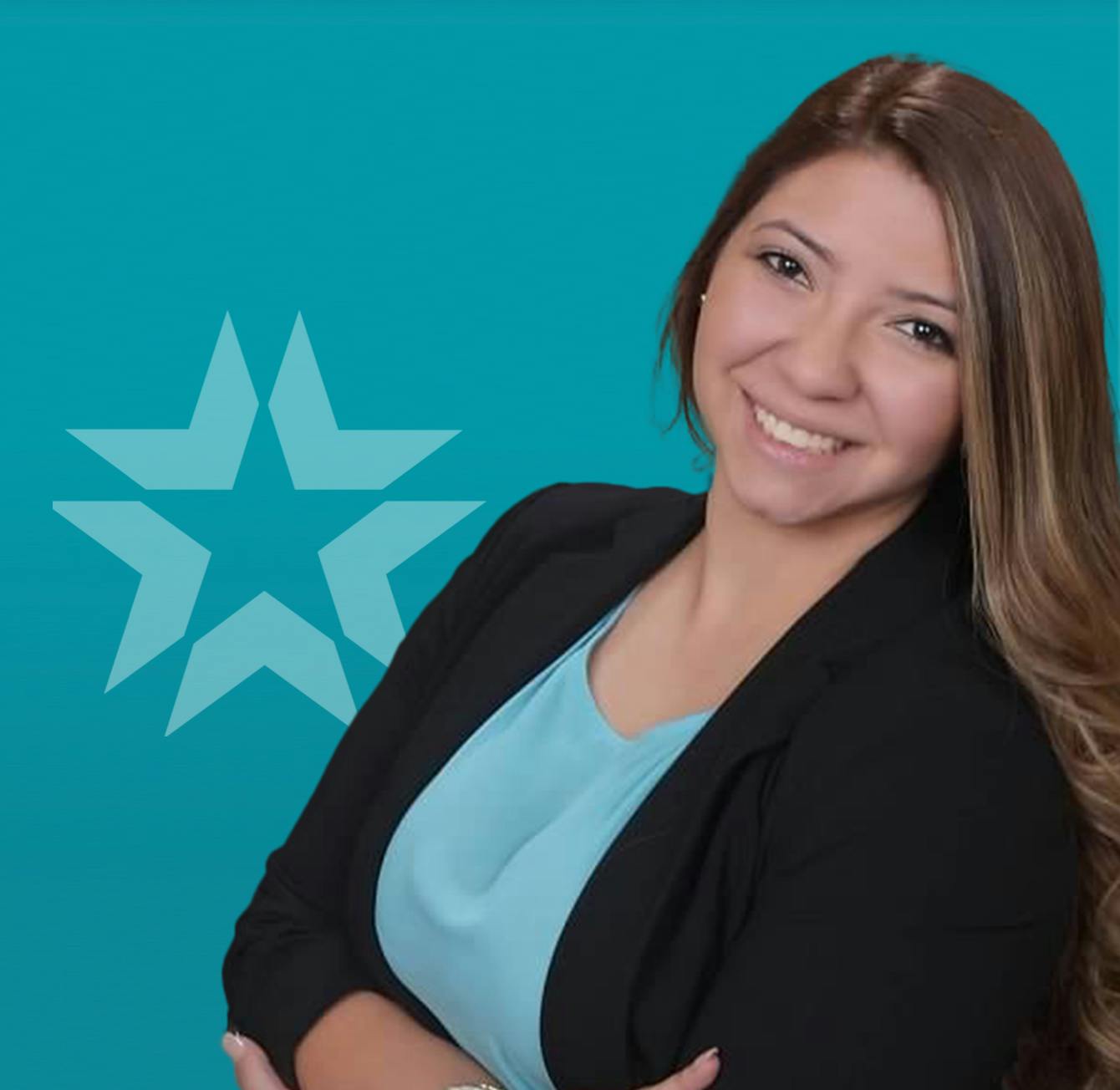 brittany guajardo headshot with a blue background