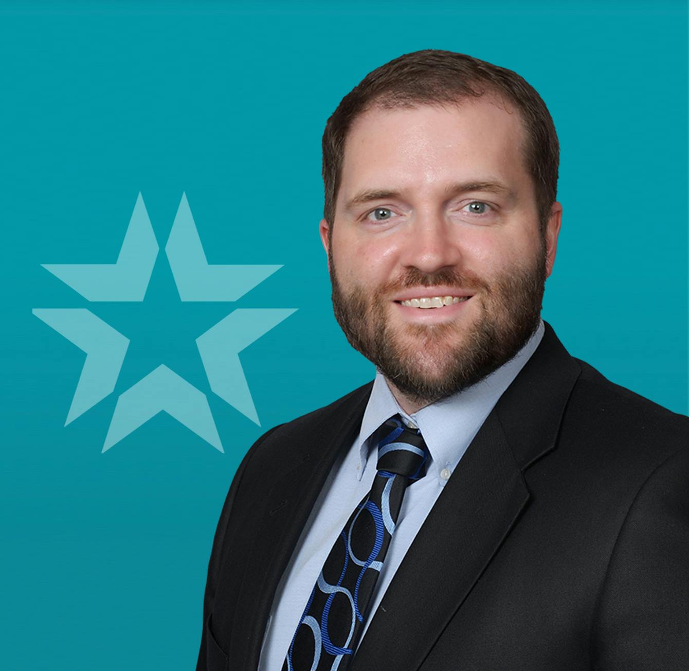 kody brooks headshot with a blue background