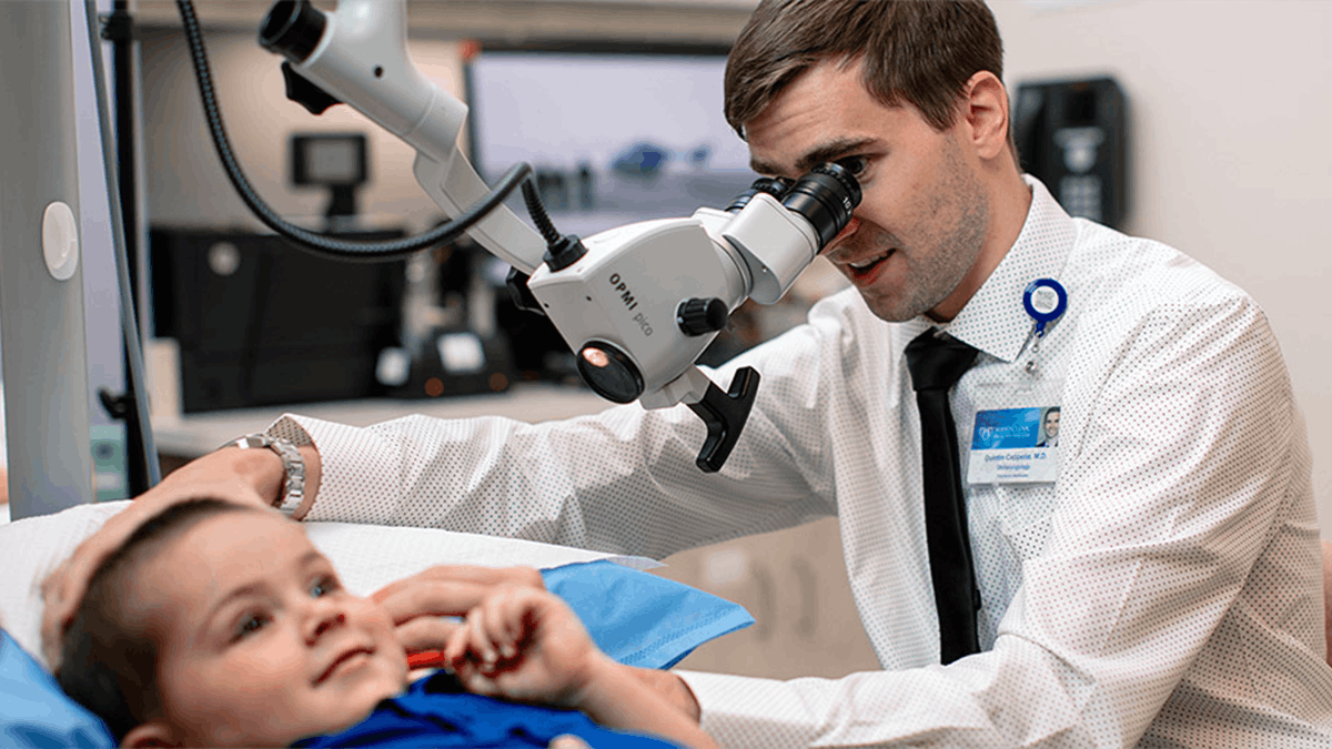 Doctor treating a child