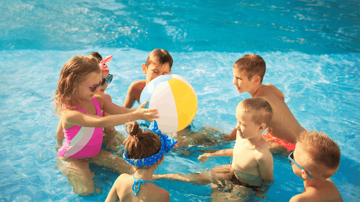 an image of handful of children playing in a pool