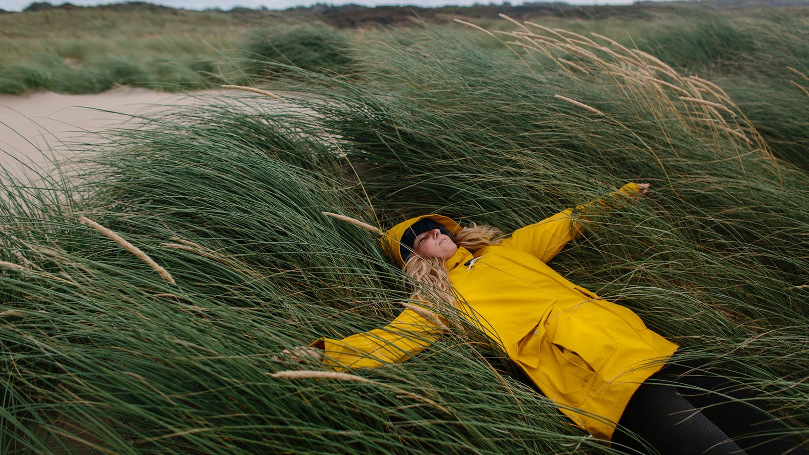 Woman Laying in a Field