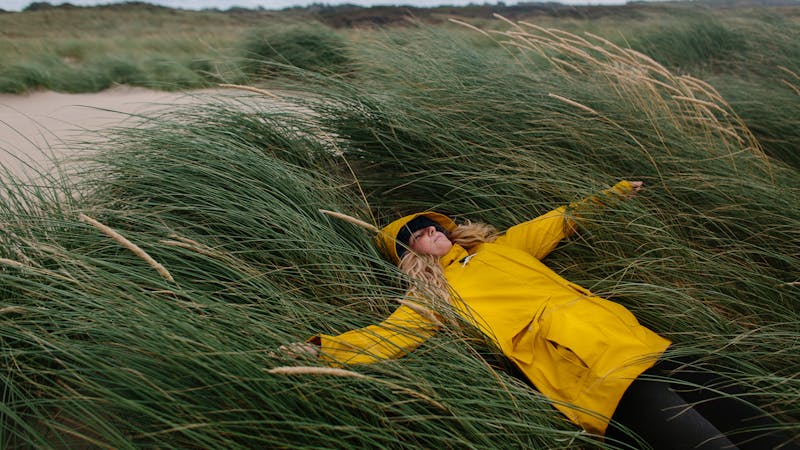 Woman Laying in a Field