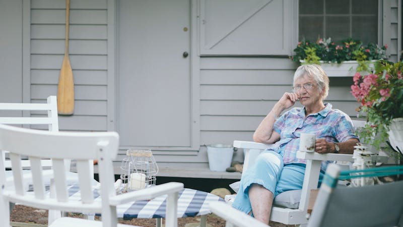 Woman Sitting Outside
