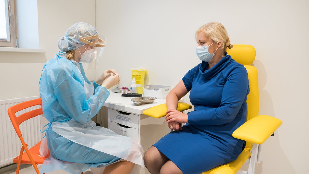 an image of a doctor with a female patient