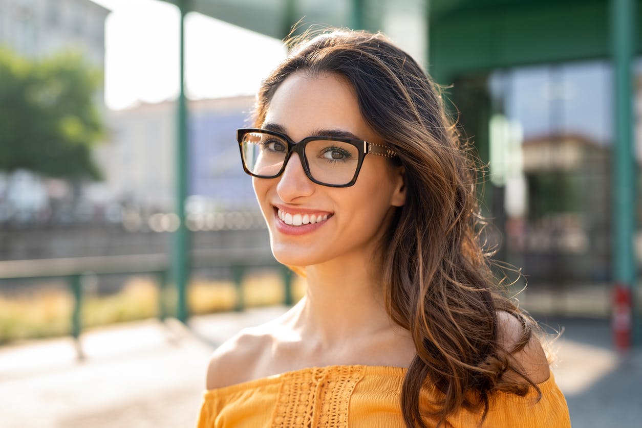 Women With Big Rimmed Glasses Smiling