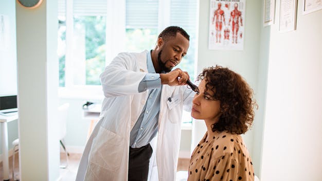 Doctor treating a patient