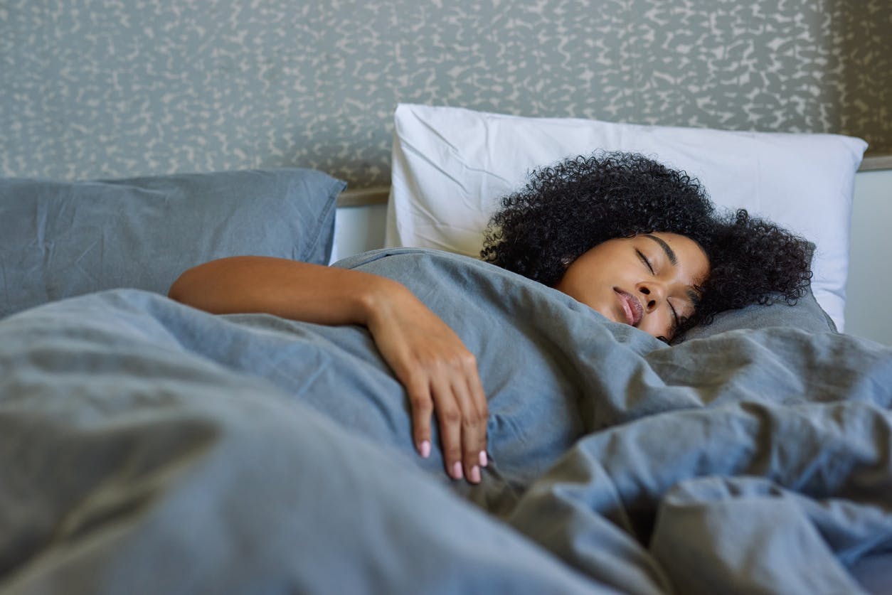 Woman sleeping in bed