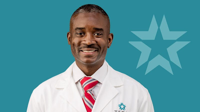 dr. briscoe headshot with a blue background
