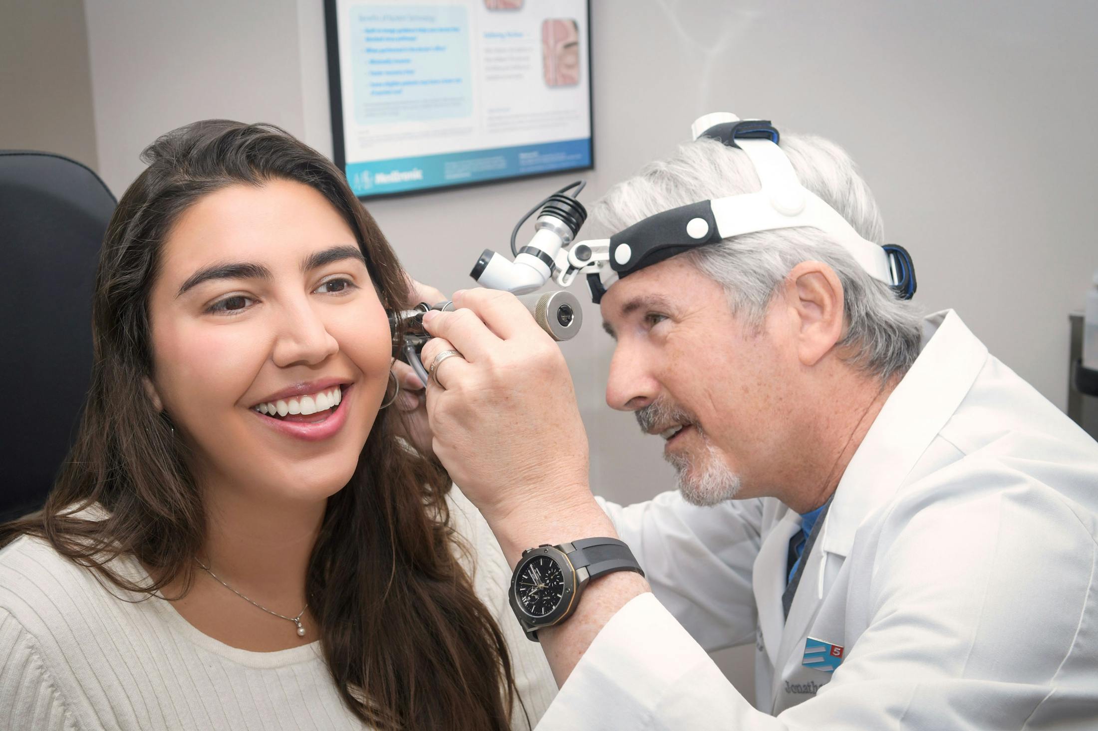 woman getting an ear exam