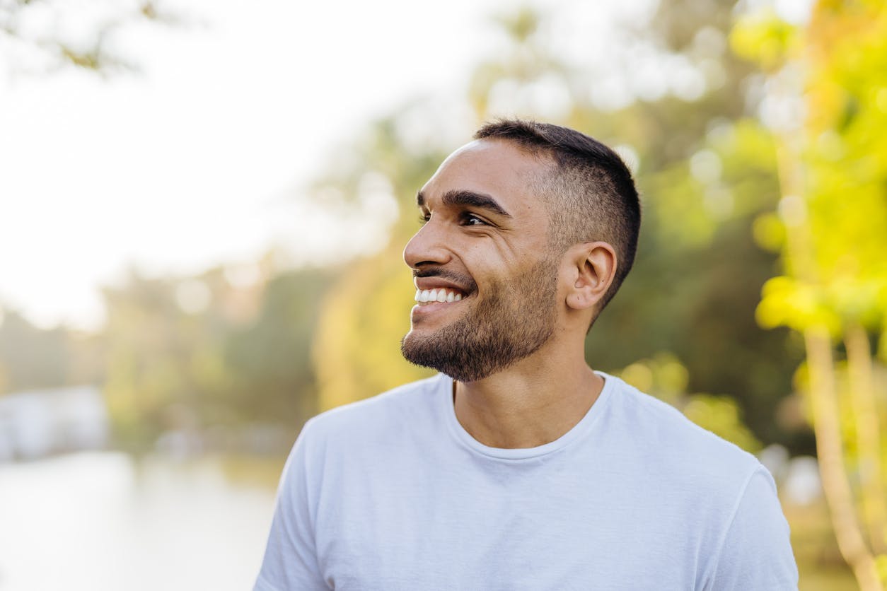 man smiling outside