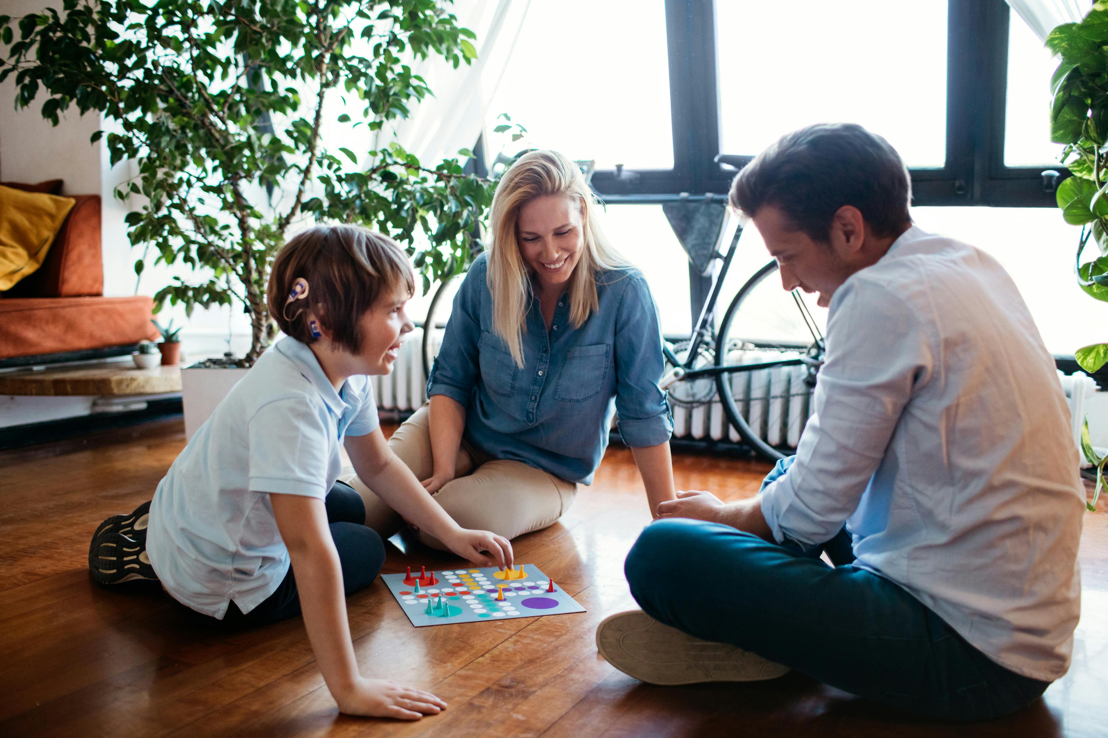 family playing board games