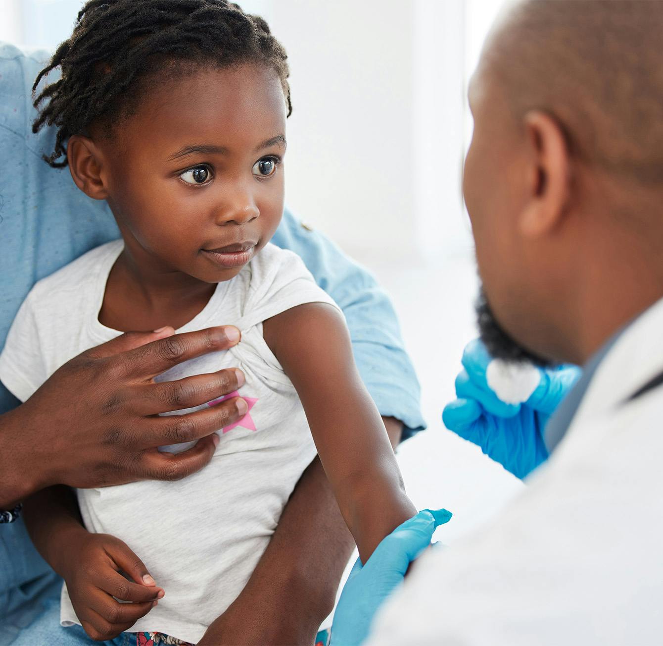 Doctor with child patient