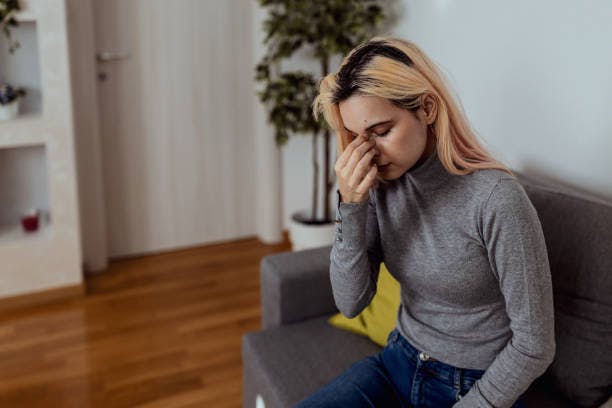 Woman with Sinus Treatment
