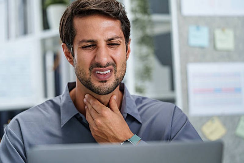 Man Clearing his Throat