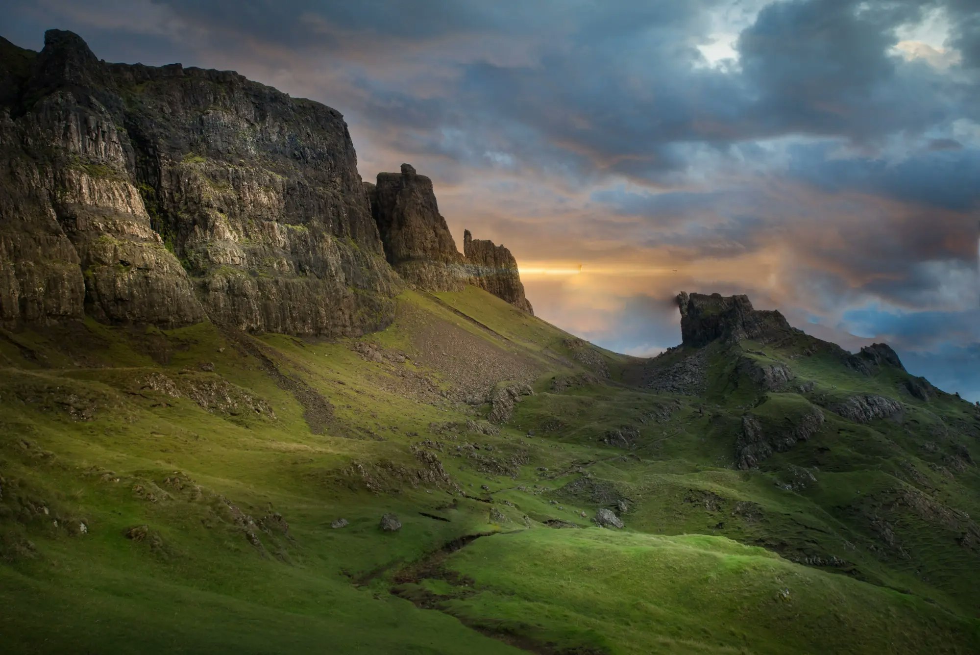A quiet river bend below Scottish hills