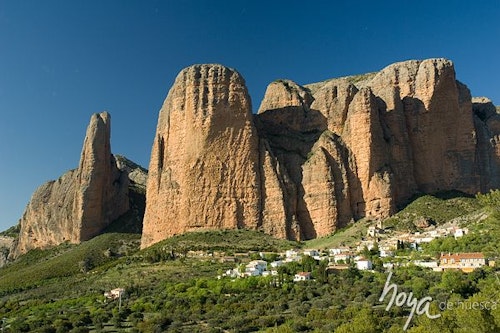 Rock climbing on the classic routes in the Mallos de Riglos in Huesca, Spain