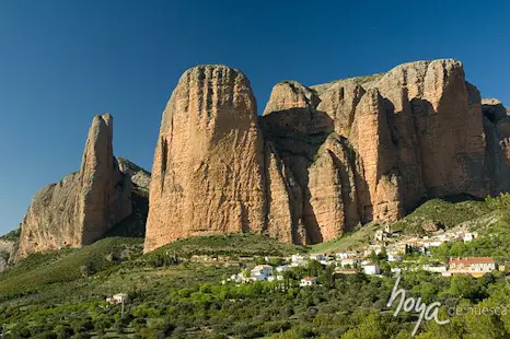 Rock climbing on the classic routes in the Mallos de Riglos in Huesca, Spain