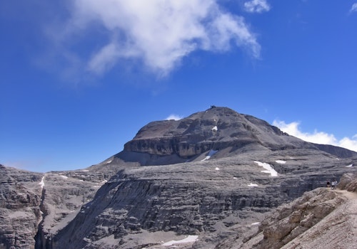 Climb the Cesare Piazzetta via ferrata to the top of Piz Boè (Sella Group) in the Dolomites