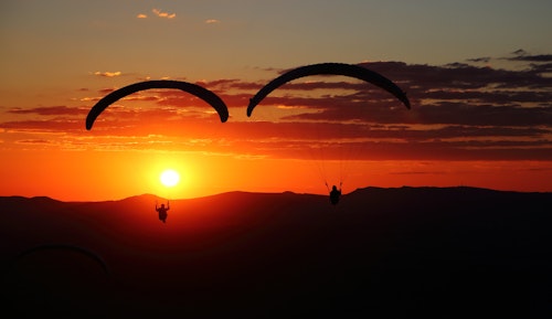 Tandem paragliding flight over Jarabacoa in the Dominican Republic, near Constanza