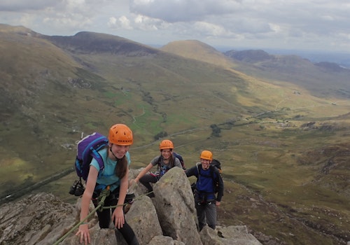 Guided scrambling in the Snowdonia National Park in Wales, near Llanberis