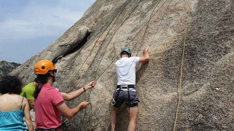 Beginners rock climbing and rappelling, Sierra de Guadarrama National Park, near Madrid