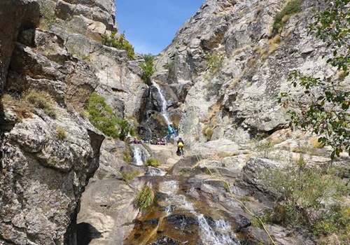 Madrid multi-adventure day: Canyoning near Somosierra and piragua in Buitrago de Lozoya