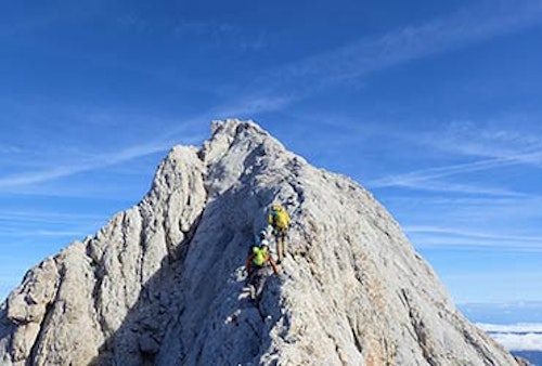 Rock climbing the peaks in Picos de Europa, near Fuente Dé