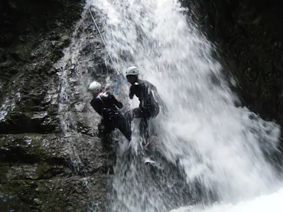 Multi-adventure day trip from Madrid: Canyoning, rappelling