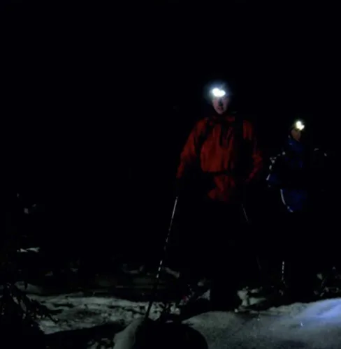 Night snowshoeing adventure in Pessons Forest