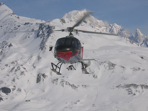 Full-day group heliboarding in Val d’Aran