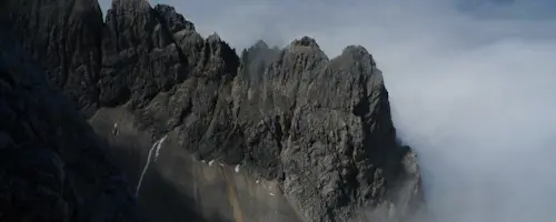 Traversing the Siroka Pec Ridge to the Dovski Kriz Mountain