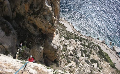 Multi-pitch climbing on the Penyal d’Ifac, Spain