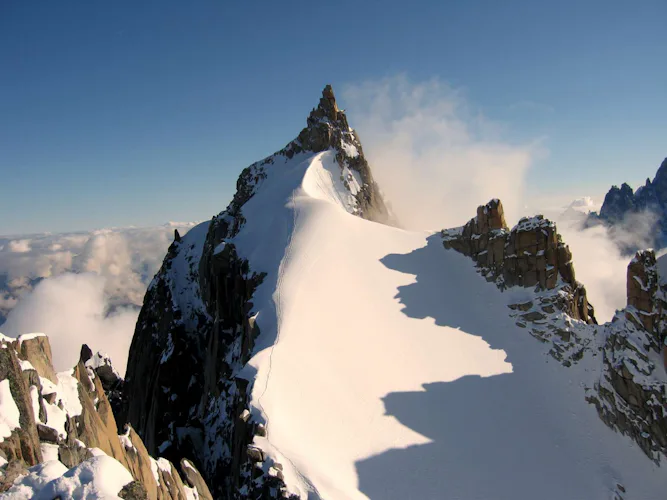 Mountaineering in the Alps with a guide