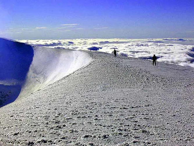 Ski ascent to Lanin Volcano summit