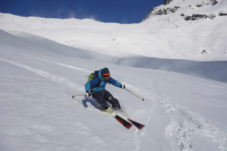 Freeride skiing with a guide in Sella group, Italy