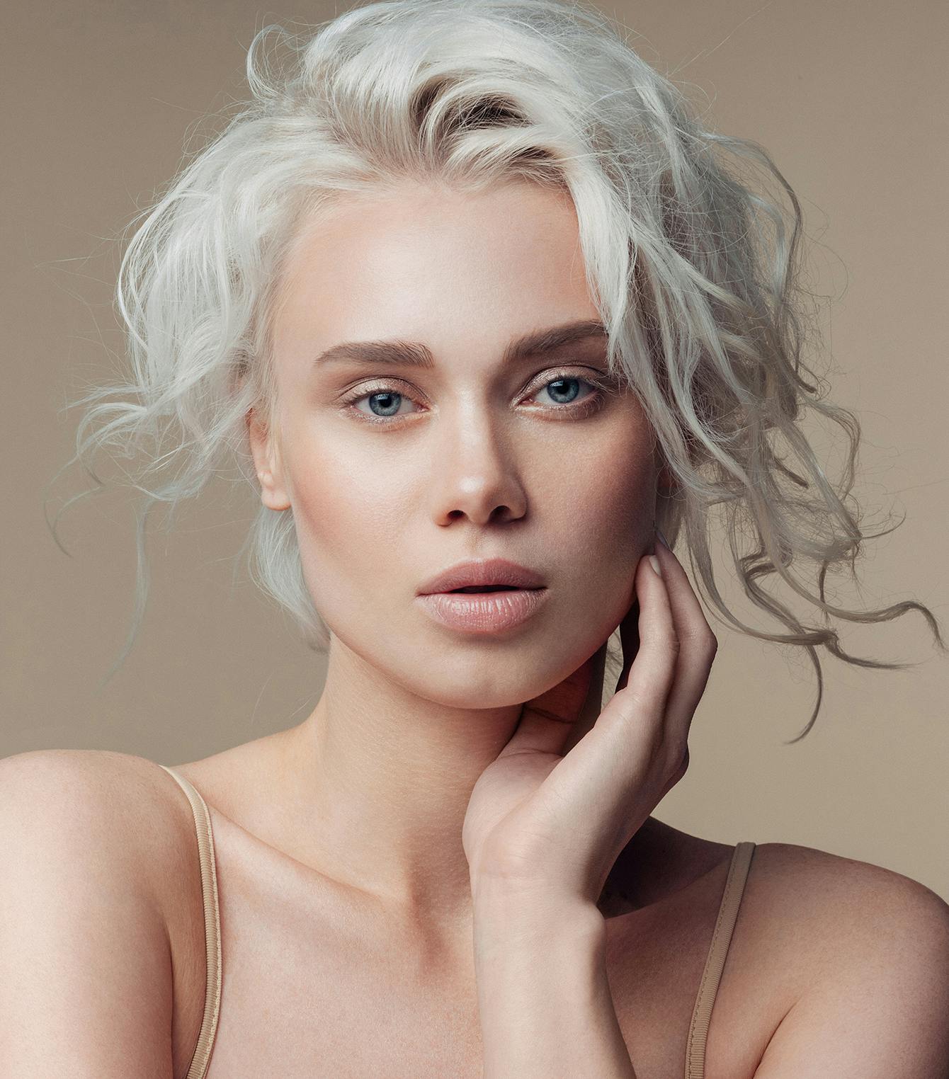 Woman with blue eyes and white hair