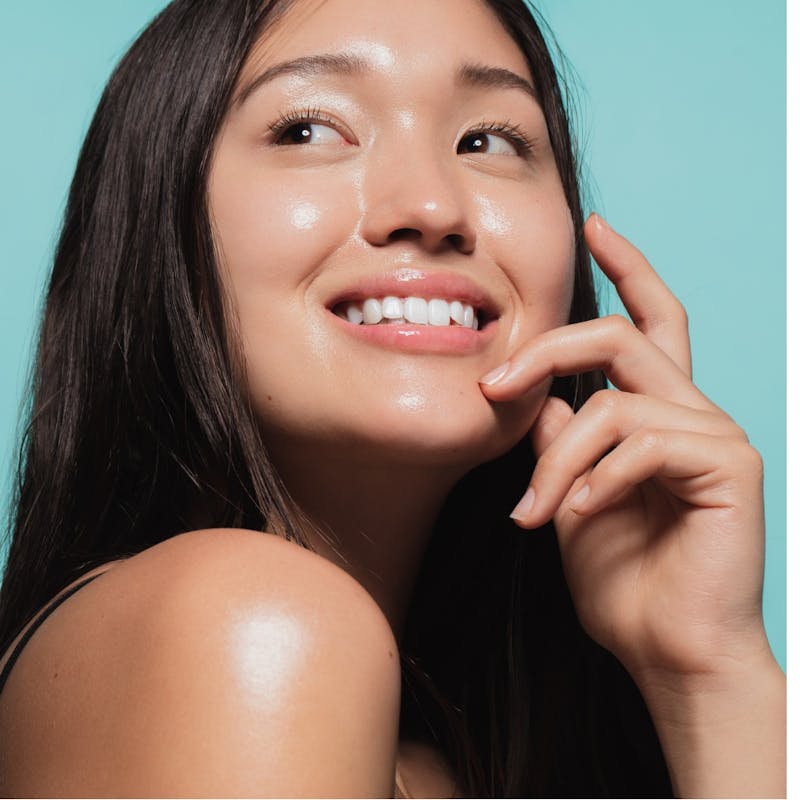 Pretty Asian Women Looking Towards The Side And Has Big Smile