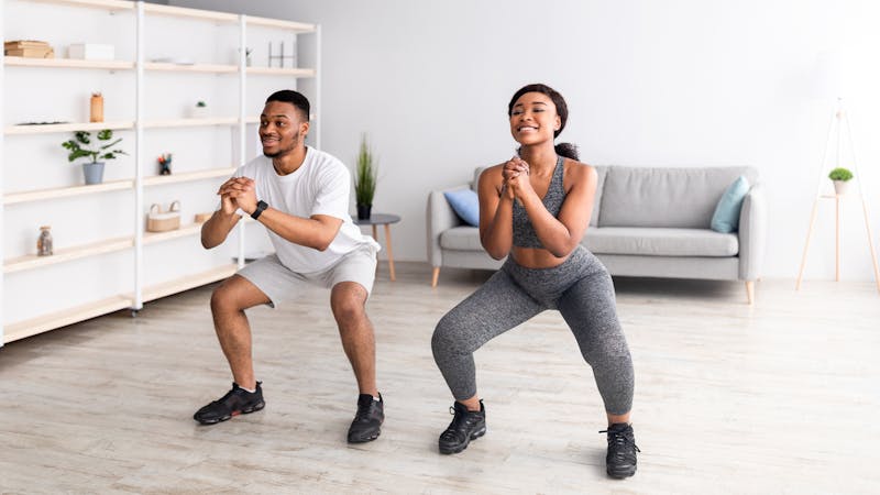 man and woman working out